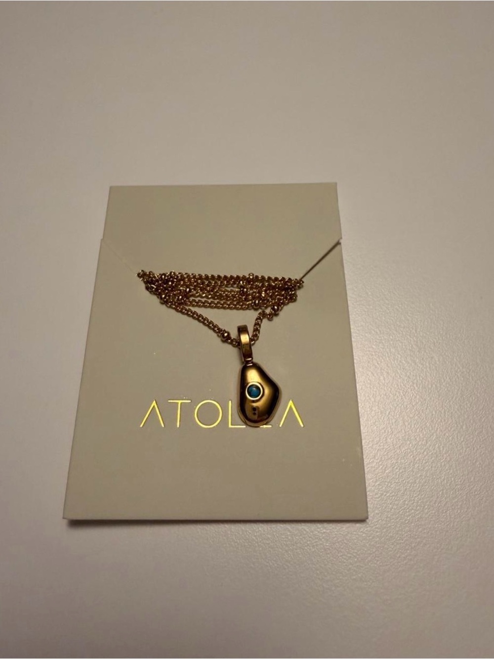 Gold Teardrop Pendant Necklace with Turquoise Stone